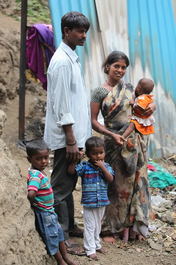 poor-indian-family-father-mother-three-children-standing-construction-site-work-73024345